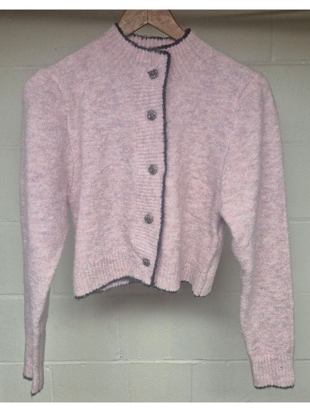 The Mantle Pink Mohair Blend Cardigan Sweater with Black Trim and Decorative Gem